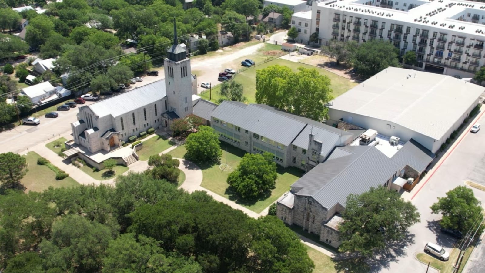 Aerial view of a church campus roofing project in Central Texas