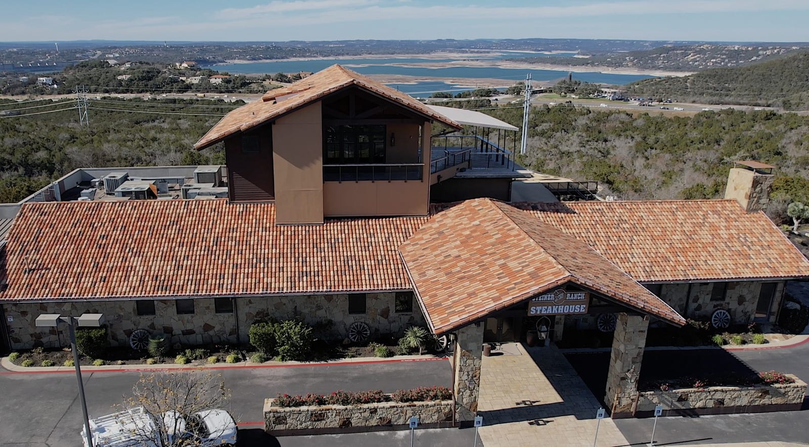 Tile roof and entry tower at Steiner Ranch Steakhouse above Lake Travis