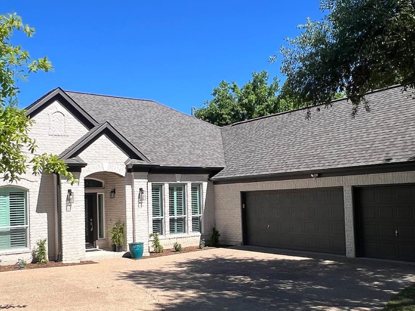 Austin home with a completed architectural shingle roof